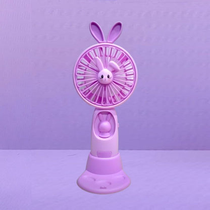 Kipas Angin Genggam Tangan Karakter Bunny Dengan LED + Holder Penyangga HP / Handy Mini Fan Portable Rechargeable Elektrik Motif Kelinci Lucu Travel Size Travelling Outdoor Konser Piknik Pantai Jogging CFD Luar Ruangan Make Up Skincare Multifungsi